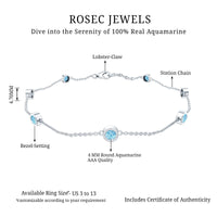 Bezel set aquamarine station bracelet for women by Rosec Jewels featuring blue gemstones on a delicate silver chain.