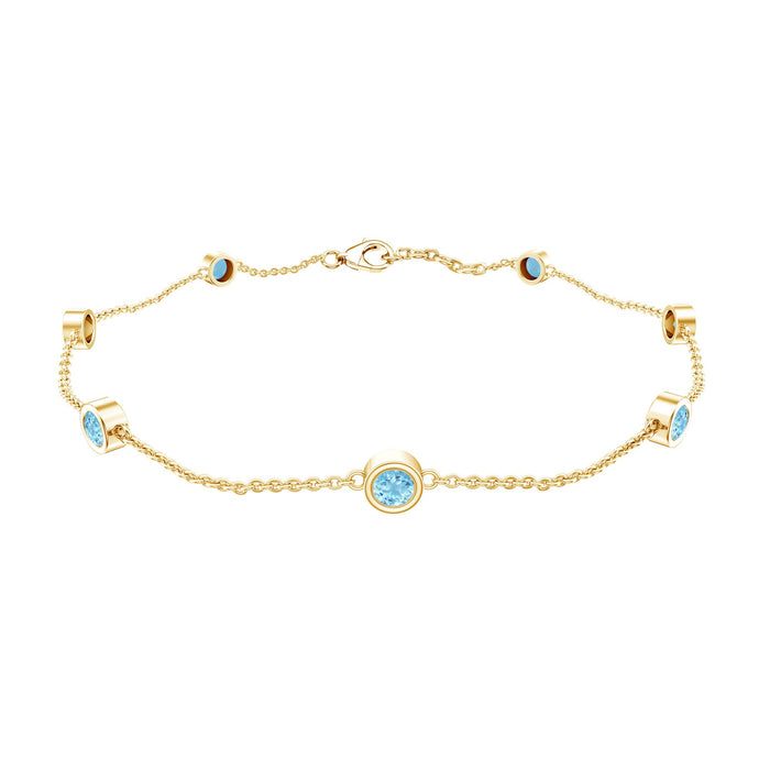 Bezel set aquamarine station bracelet for women featuring blue gemstones and silver chain from Rosec Jewels.