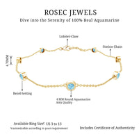Bezel set aquamarine station bracelet for women by Rosec Jewels, featuring blue gemstones on a delicate silver chain.