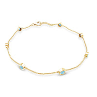 Bezel set aquamarine station bracelet for women by Rosec Jewels with alternating aquamarine gemstones on a delicate metal chain.