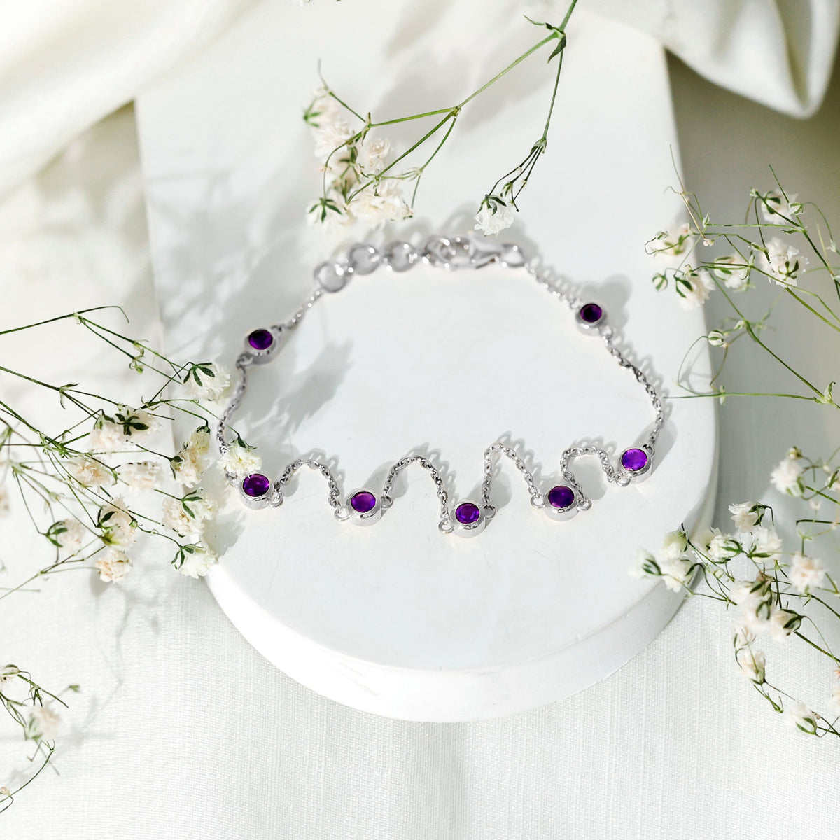 Real amethyst chain bracelet in bezel setting by Rosec Jewels, featuring a delicate purple gemstone design.