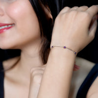 Real amethyst chain bracelet by Rosec Jewels featuring bezel-set purple amethyst stones on a delicate silver chain.