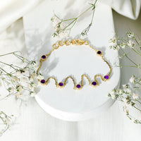 Real amethyst chain bracelet with bezel setting by Rosec Jewels featuring purple gemstones on a delicate silver chain.