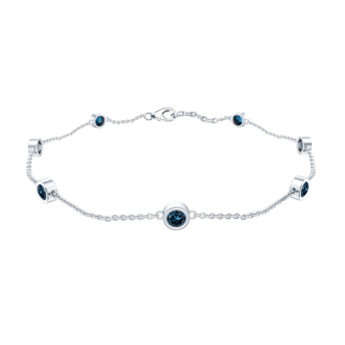 Rosec Jewels bezel set London Blue Topaz station chain bracelet with sparkling blue gemstones on a delicate silver chain.