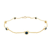 Bezel set London Blue Topaz station chain bracelet by Rosec Jewels with sparkling blue gemstones and delicate silver chain.