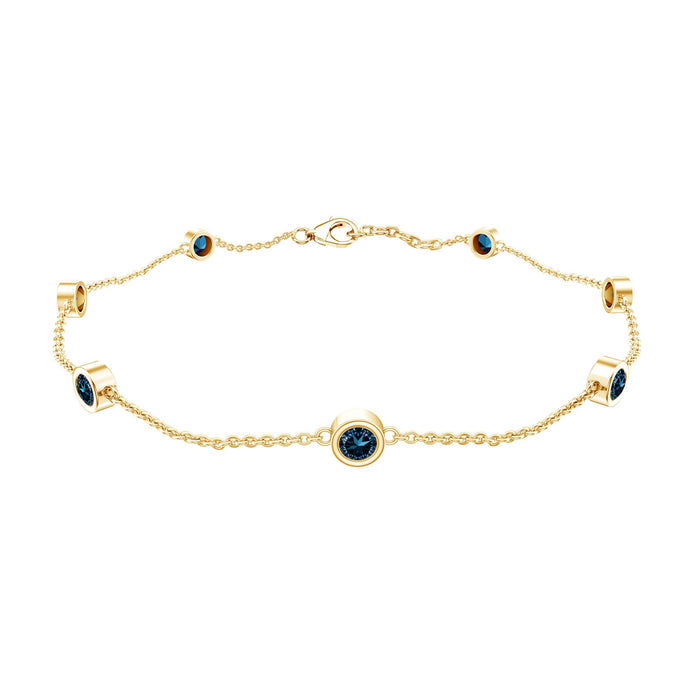 Bezel set London Blue Topaz station chain bracelet by Rosec Jewels with sparkling blue gemstones and delicate silver chain.