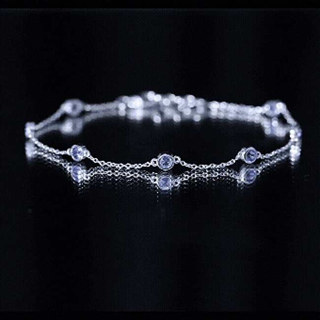 Certified natural Tanzanite chain bracelet for women featuring vibrant blue-violet gemstones and a delicate rose gold chain.