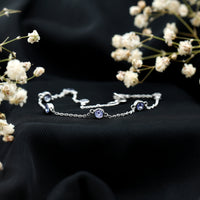 Rosec Jewels natural Tanzanite chain bracelet for women, featuring vibrant blue gemstones on a delicate silver chain.