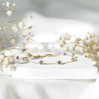 Certified natural Tanzanite chain bracelet for women featuring vibrant blue gemstones and a delicate silver link design.
