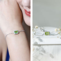 Emerald cut peridot and diamond bolo chain bracelet featuring 1.8 carats of gemstones from Rosec Jewels
