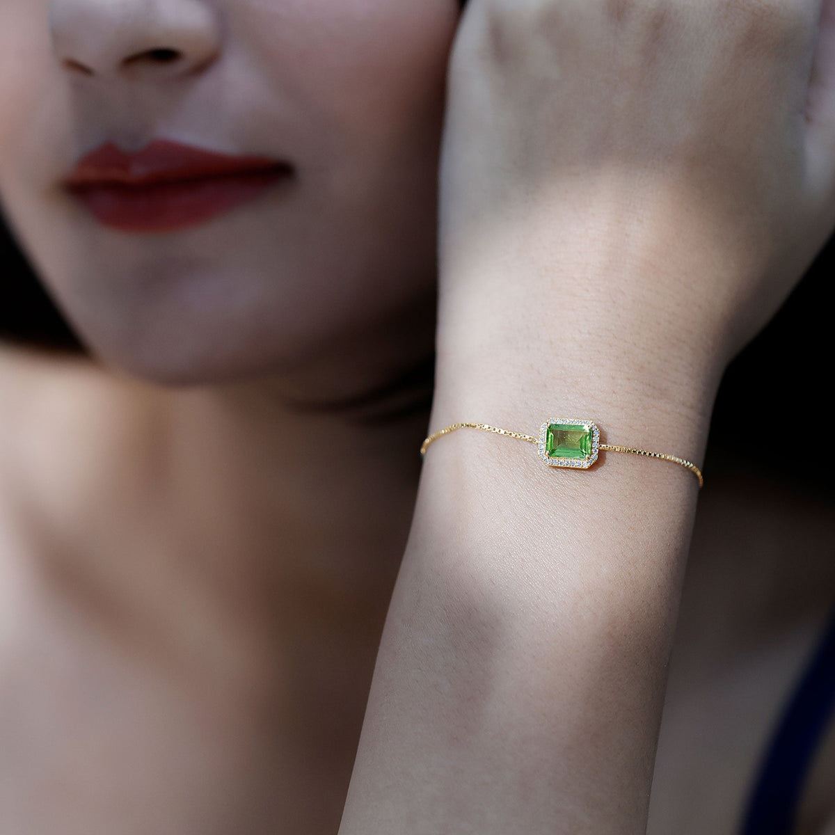 Emerald cut peridot and diamond bolo chain bracelet with rose gold finish from Rosec Jewels, showcasing intricate design and sparkling stones.