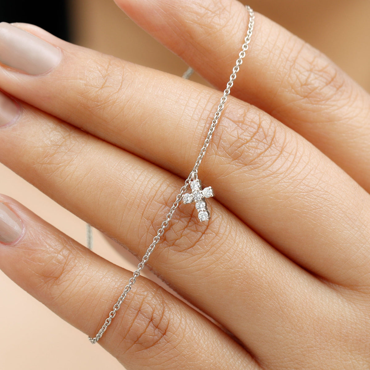 Certified moissanite cross charm chain bracelet for women by Rosec Jewels, featuring sparkling moissanite stones and a delicate design.