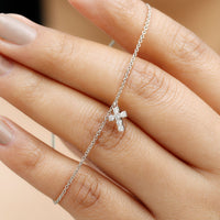 Certified moissanite cross charm chain bracelet for women by Rosec Jewels, featuring sparkling moissanite stones and a delicate design.