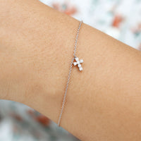 Certified Moissanite Cross Charm Chain Bracelet for Women by Rosec Jewels, featuring a delicate silver-toned design with sparkling moissanite accents.