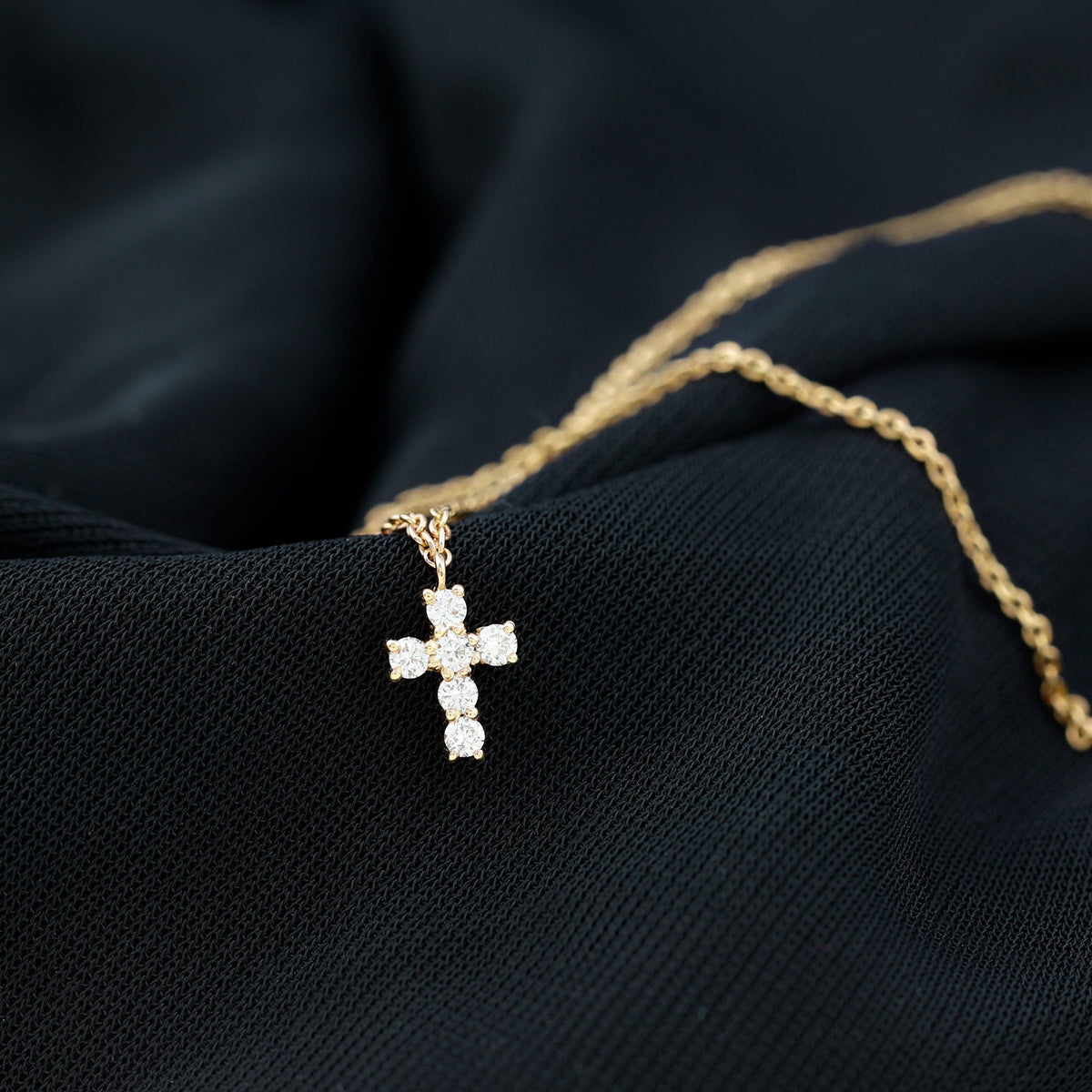 Certified Moissanite cross charm bracelet for women by Rosec Jewels, featuring a delicate chain and sparkling cross pendant.