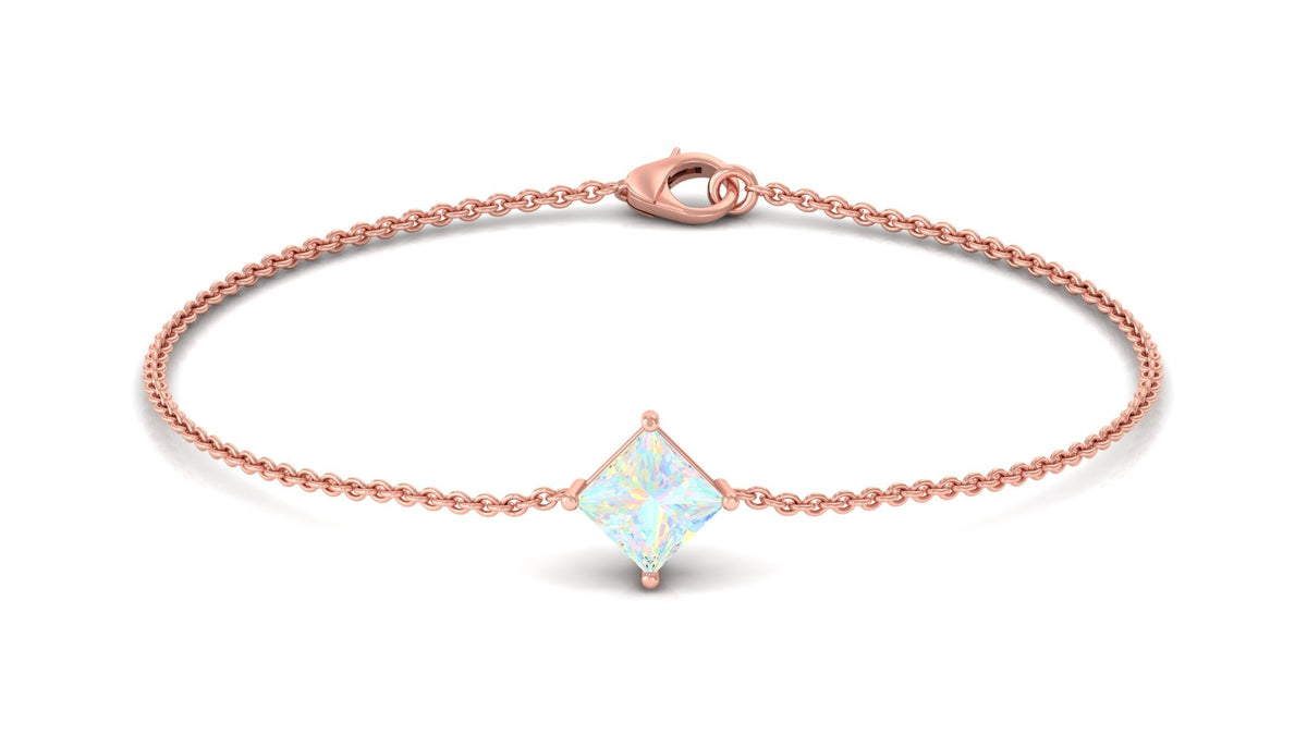 2 carat princess cut Ethiopian opal solitaire chain bracelet by Rosec Jewels featuring a sparkling gemstone on a delicate silver chain.