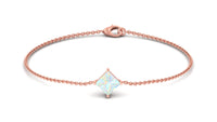 2 carat princess cut Ethiopian opal solitaire chain bracelet by Rosec Jewels featuring a sparkling gemstone on a delicate silver chain.