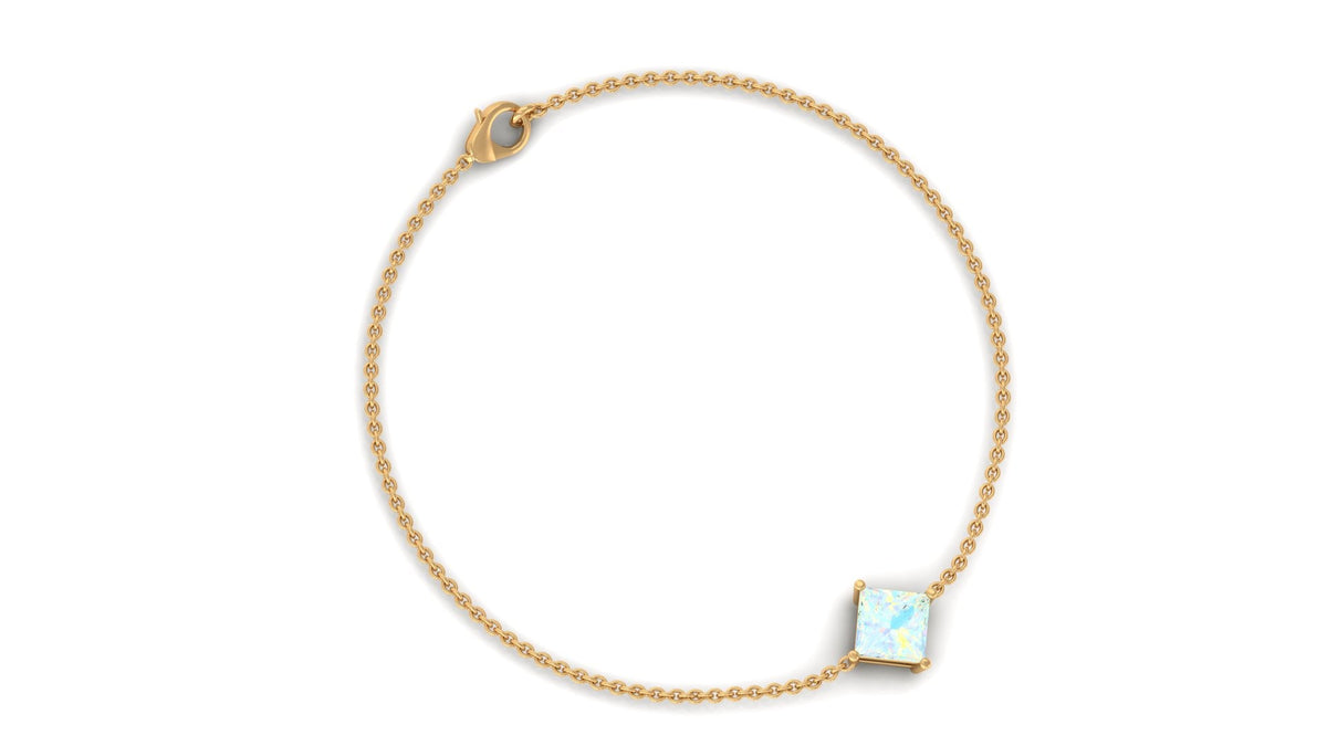 Two-carat princess cut Ethiopian opal solitaire chain bracelet by Rosec Jewels featuring a sparkling gemstone on a delicate silver chain.