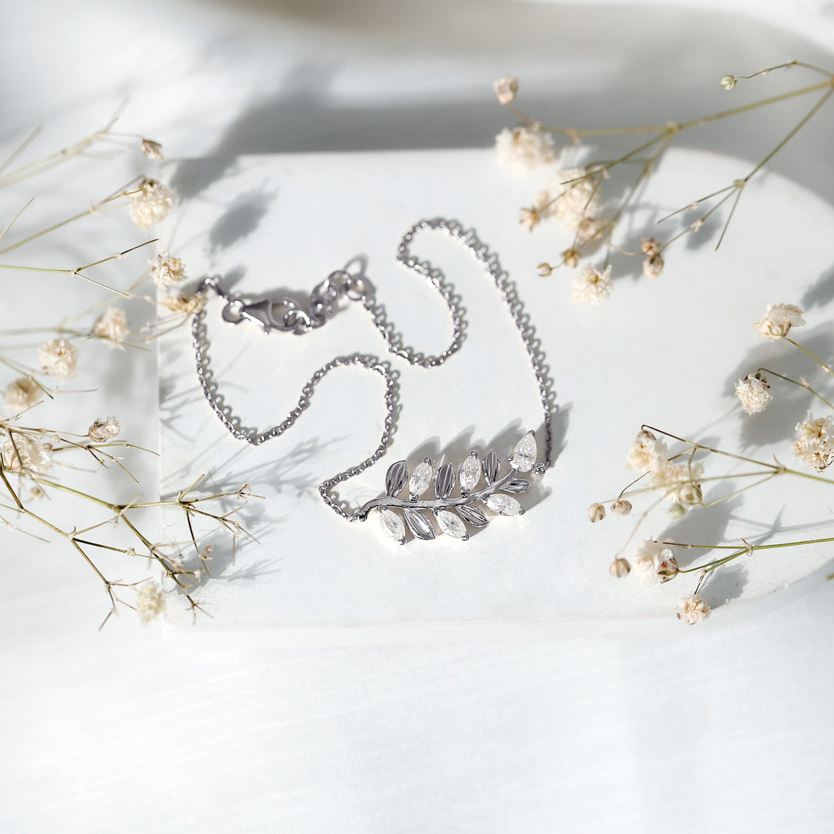 Elegant Moissanite leaf chain bracelet for women by Rosec Jewels, featuring sparkling leaf-shaped links on a delicate chain.