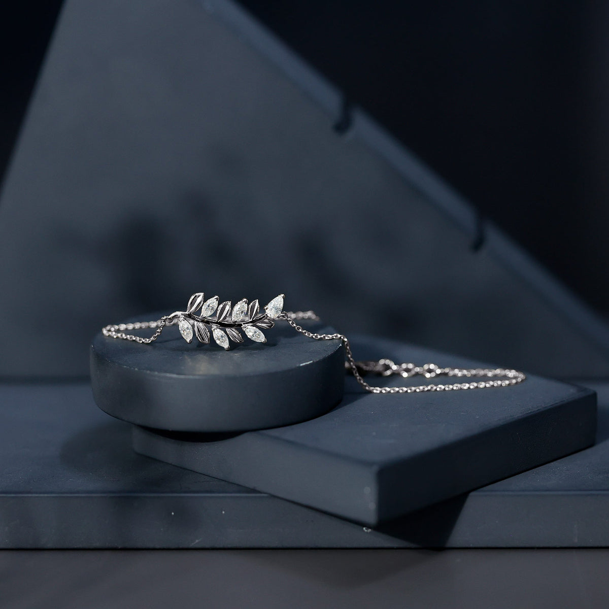 Elegant Moissanite leaf chain bracelet for women featuring sparkling moissanite stones and intricate leaf design.