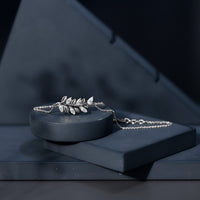 Elegant Moissanite leaf chain bracelet for women featuring sparkling moissanite stones and intricate leaf design.