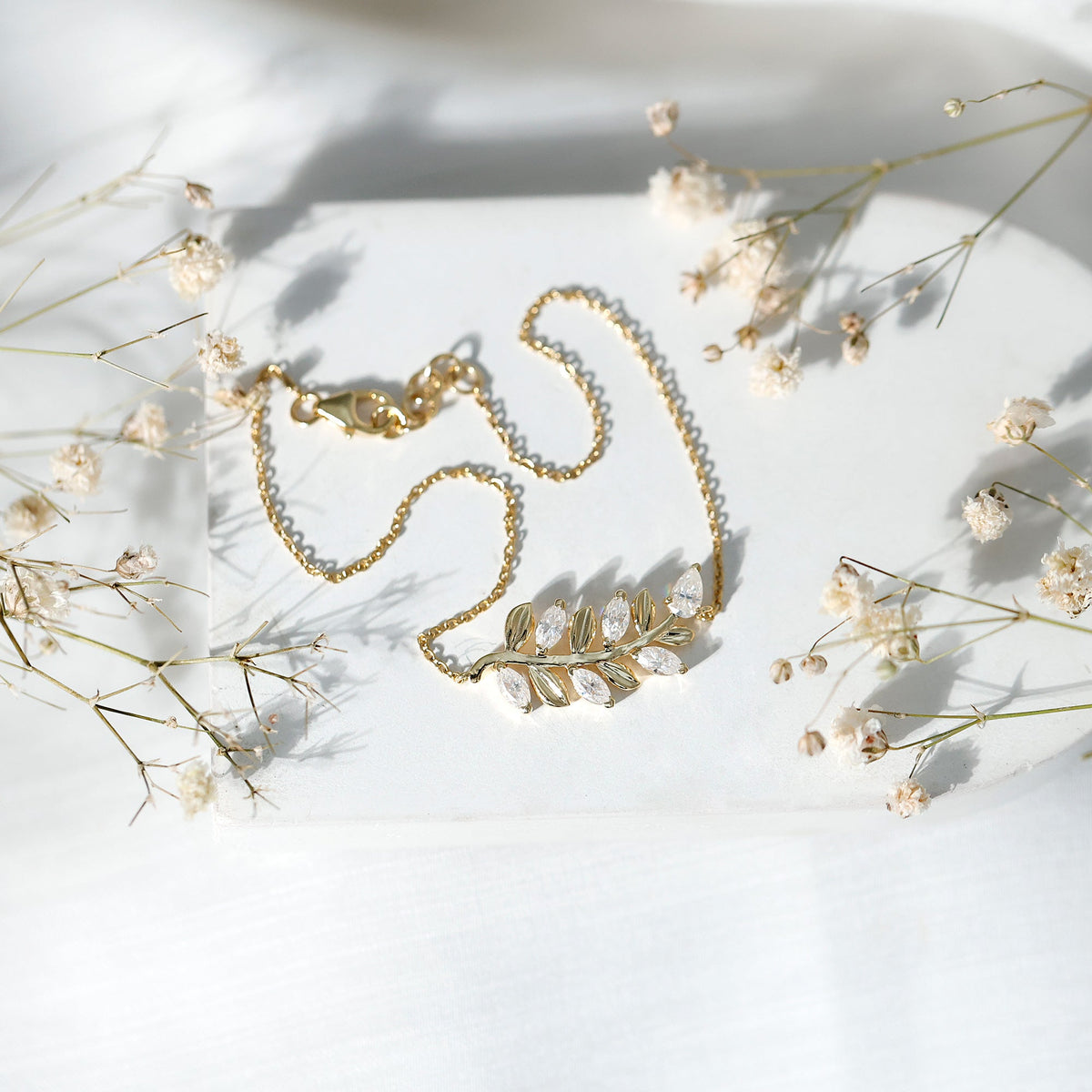 Certified Moissanite leaf chain bracelet for women featuring delicate leaf-shaped links, by Rosec Jewels.