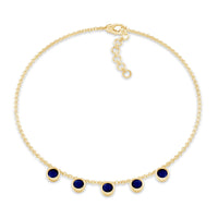 Bezel set blue sapphire charm bracelet by Rosec Jewels featuring a delicate silver chain and sparkling blue sapphires.