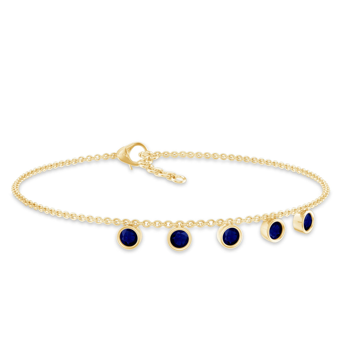 Bezel set blue sapphire charm bracelet by Rosec Jewels featuring a delicate silver chain and sparkling gemstone accents.