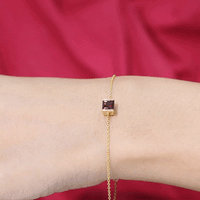 Genuine 1.4 carat princess cut garnet solitaire chain bracelet by Rosec Jewels, showcasing a yellow gemstone and delicate chain design.