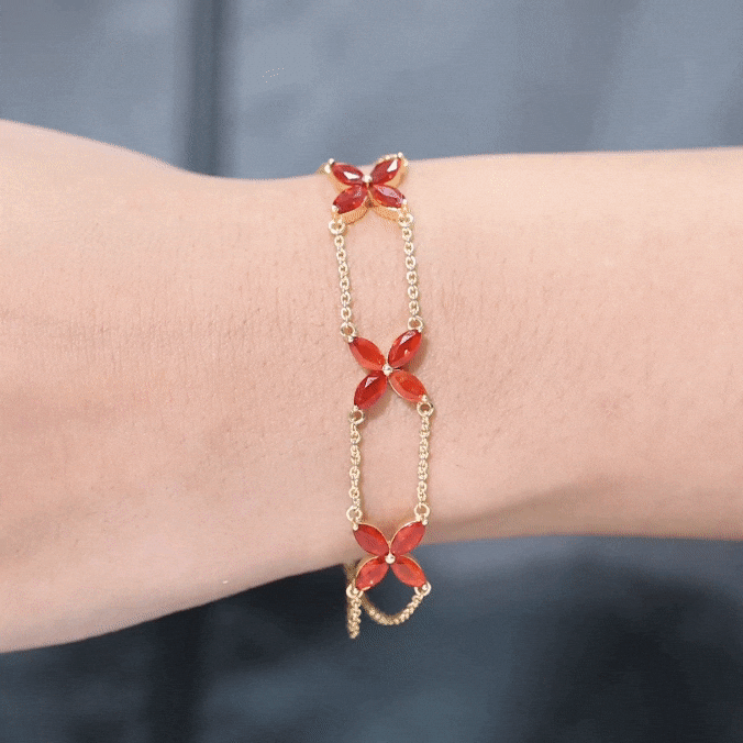 Marquise cut fire opal flower chain bracelet by Rosec Jewels featuring vibrant orange gemstones and delicate gold links