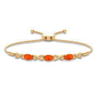 Natural 1.95 carat oval fire opal infinity bolo bracelet for women by Rosec Jewels, featuring a sparkling fire opal centerpiece.