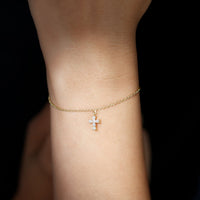 Rosec Jewels certified diamond cross chain bracelet featuring sparkling diamond accents on a delicate silver bracelet.