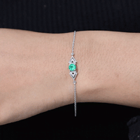 Genuine emerald and diamond chain bracelet for women by Rosec Jewels, featuring vibrant green emeralds and sparkling diamonds.