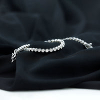 Rosec Jewels Moissanite wedding tennis bracelet featuring sparkling gemstones, perfect for brides on a special occasion.