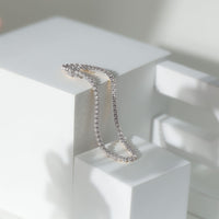 Certified Moissanite wedding tennis bracelet by Rosec Jewels with sparkling gemstones on a delicate silver chain.