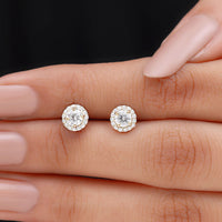 Rosec Jewels 1 CT zircon halo stud earrings featuring classic round design with sparkling central stones and a sleek metal setting.