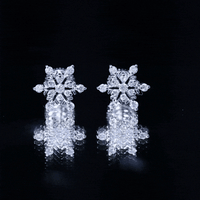 Yellow moissanite snowflake stud earrings for women by Rosec Jewels, featuring sparkling gemstone design on silver posts.