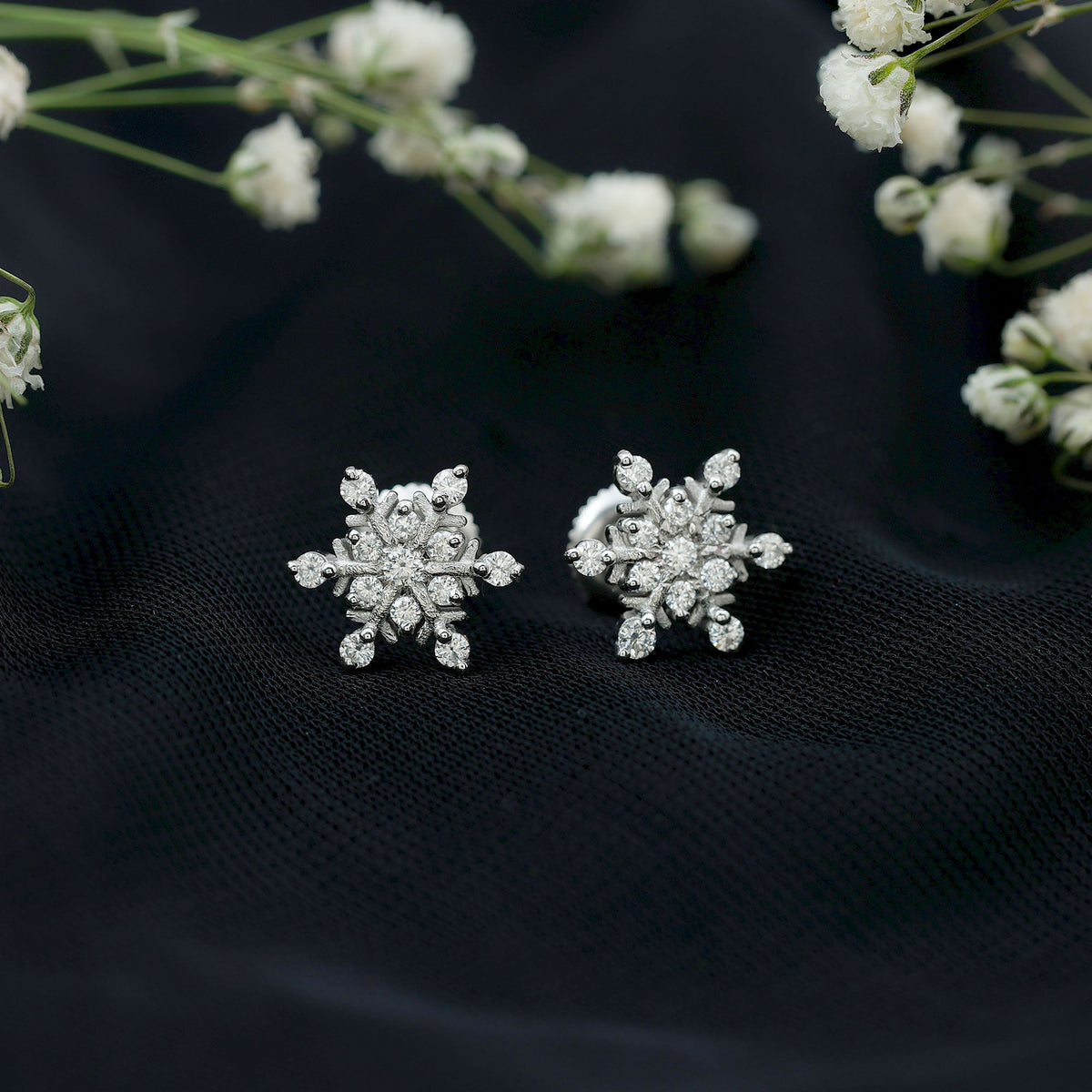 Rosec Jewels Moissanite snowflake stud earrings for women featuring sparkling gemstone design on sterling silver posts