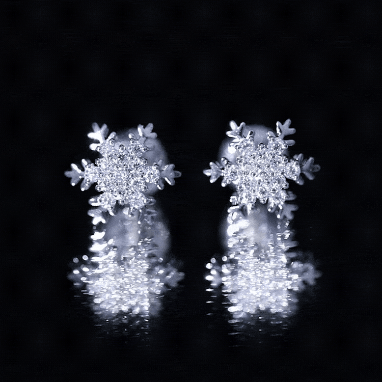 Sterling silver Moissanite winter snowflake stud earrings with sparkling white stones from Rosec Jewels.