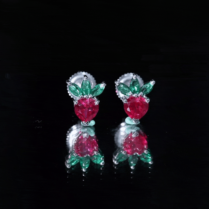 Yellow strawberry earrings by Rosec Jewels featuring lab-grown ruby and emerald accents, showcasing a playful and colorful jewelry design.