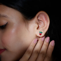 Rosec Jewels strawberry earrings with lab-grown ruby and emerald, featuring detailed fruit and gemstone accents.