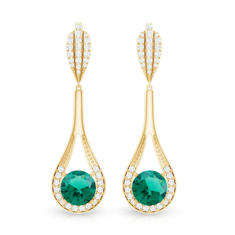 Lab-grown emerald wedding earrings with diamonds by Rosec Jewels, featuring elegant green emeralds and sparkling diamonds in earrings.