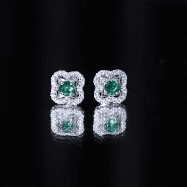 Sterling silver emerald flower earrings with sparkling moissanite accents from Rosec Jewels, showcasing intricate floral design.
