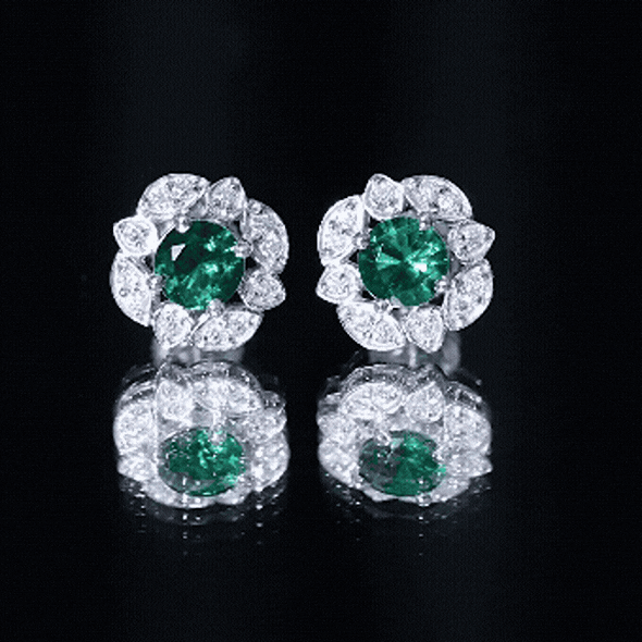 Sterling silver vintage stud earrings with 1.6 carat lab-created emeralds, featuring a classic design by Rosec Jewels.