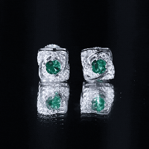 Certified half carat lab-grown emerald stud earrings with moissanite stones by Rosec Jewels, featuring sparkling green and white gemstones.