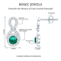 Half Carat Lab Grown Emerald Infinity Stud Earrings with Moissanite
