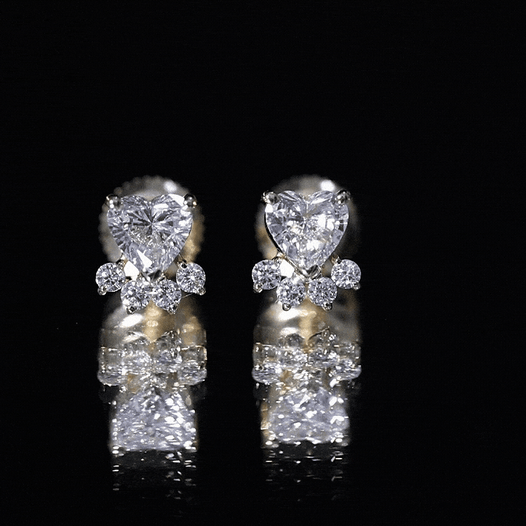 Yellow lab-grown diamond dog paw stud earrings by Rosec Jewels, featuring sparkling yellow diamonds set in sterling silver.