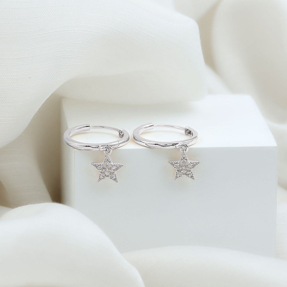 Rosec Jewels diamond star drop hoop earrings featuring sparkling diamond accents and a sleek hoop design.