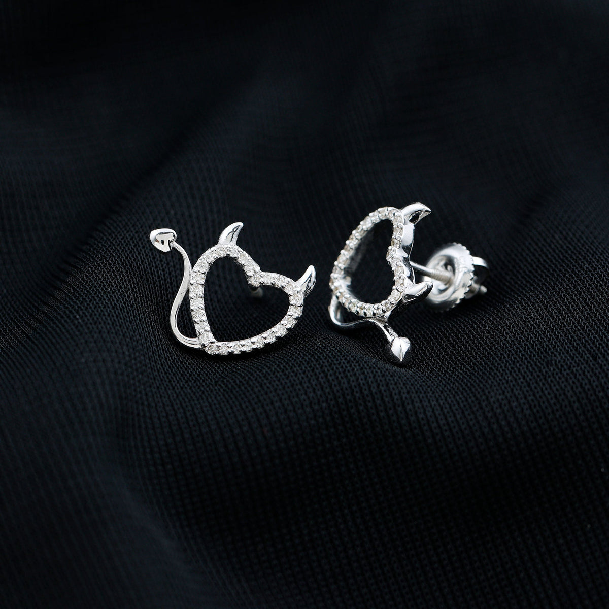 Rosec Jewels round diamond devil heart earrings featuring sparkling diamond accents and a unique devil heart design.