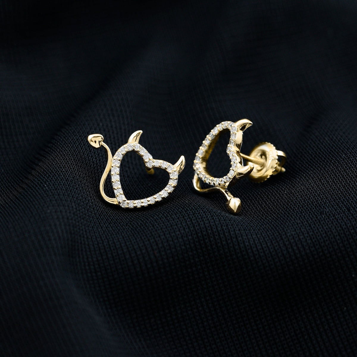 Round diamond devil heart earrings by Rosec Jewels featuring sparkling diamond accents and a unique devil heart design.